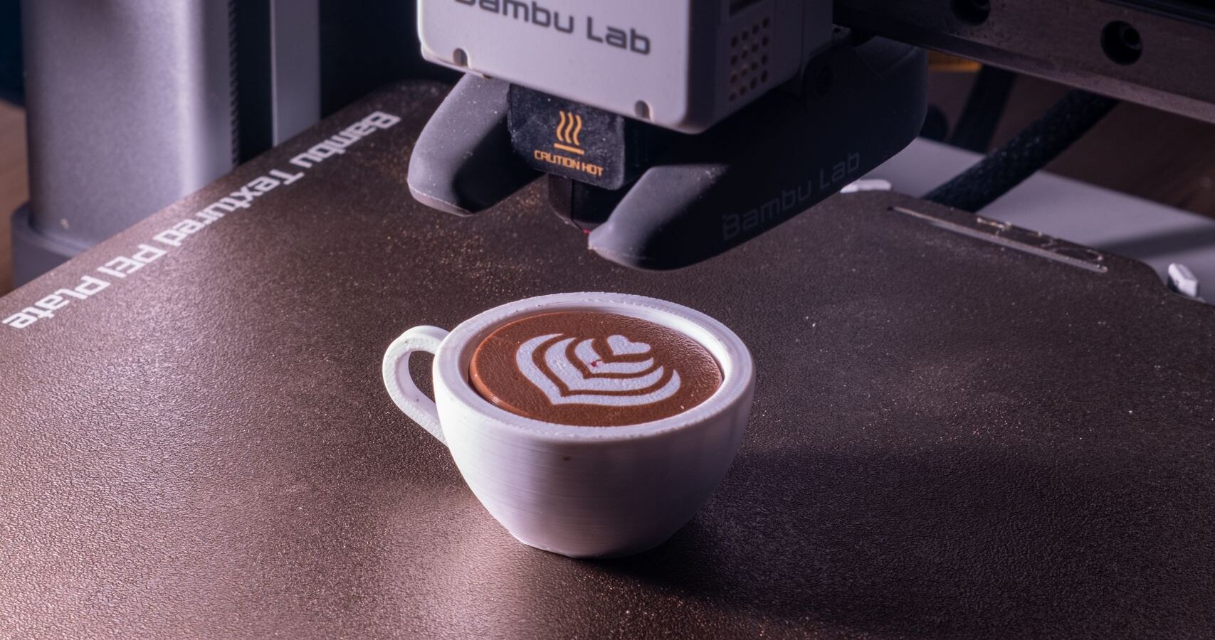 3D printer creating a detailed coffee-cup model